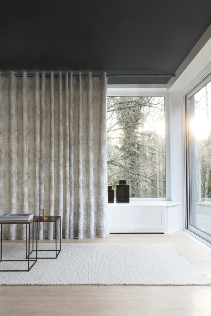 Drapery over a large living room window