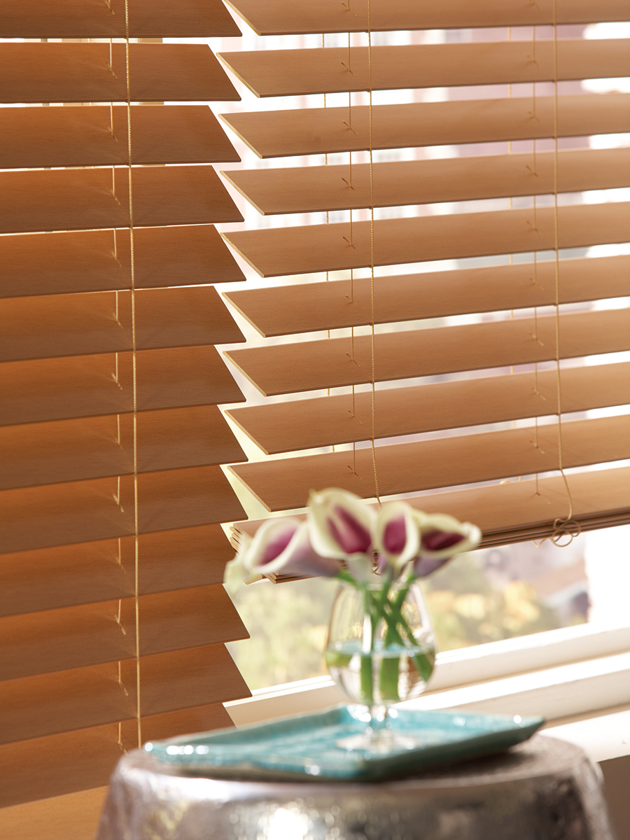 A close up on faux wood blinds 