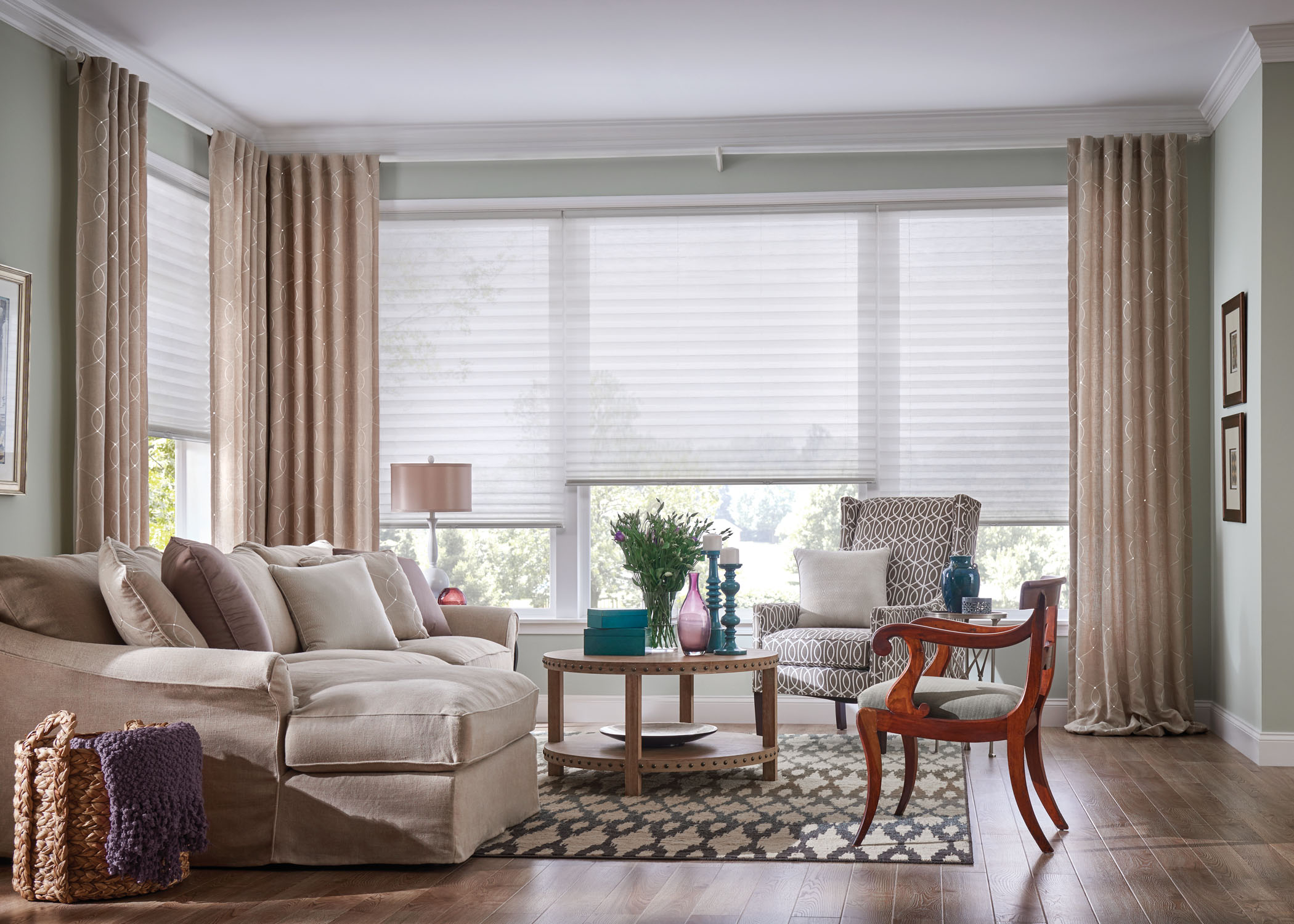 Sheer shades being shown in the living room 