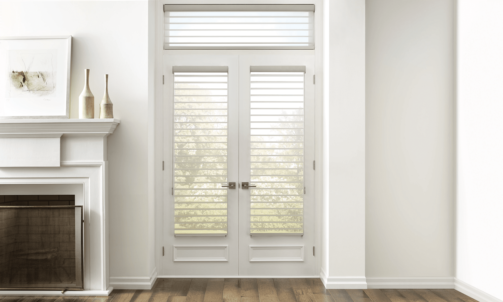 plantation-shutters-specialty-windows-denver.jpg White French doors with horizontal blinds, flanked by white walls and a mantel with vases and artwork, lead to a sunlit outdoor area.
