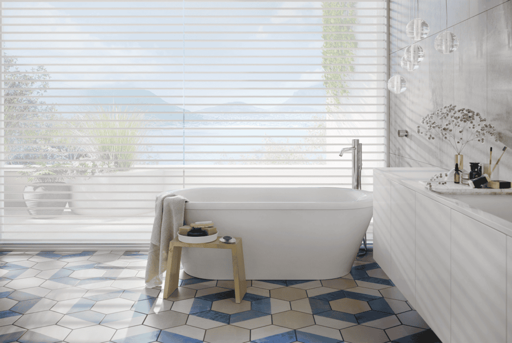 Light-filtering automated shades in a bright luxury bathroom